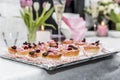 Beautiful image of cupcakes with brown, red and pink decoration