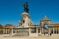 Beautiful image of the gate and landmark statue of King Jose on the Commerce square Praca do Comercio in Lisbon, Portugal with