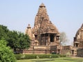 Beautiful image of Kandariya Mahadeva temple, Khajuraho, Madhyapradesh, India with blue sky and fluffy clouds in the background, Royalty Free Stock Photo