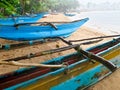 Beautiful image of lots of blue painted fishing boats on the sandy ocean beach, Sri Lanka Royalty Free Stock Photo