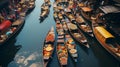 Beautiful image of popular Thailand landmark destination floating market on the calm river water. Sellers offering fruits and