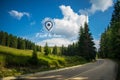 A beautiful image with a road that crosses the mountains, a pine conifer and the message i will be there. Gps location icon