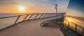 Cruise ship deck at sunset. Reflection of the sun in the window. Royalty Free Stock Photo