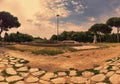 Beautiful and immersive scenic landscape at  sunset in Square of Victory located at  the archeological excavation at Ostia Antica Royalty Free Stock Photo