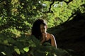 Beautiful Indian Asian girl looking down creating a sultry pensive look Royalty Free Stock Photo