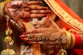 Beautiful Indian bride hands henna design hand jewelry and kalira Royalty Free Stock Photo