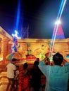 Beautiful indian classical dance with traditional costume statue around many people made in goddess durga puja pandaal