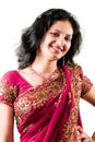 Beautiful Indian happy woman in pink sari