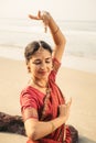 Beautiful indian woman dancer in traditional clothes at sunset Royalty Free Stock Photo