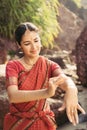 Beautiful indian woman dancer in traditional clothes at sunset Royalty Free Stock Photo