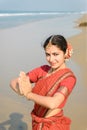 Beautiful indian woman dancer in traditional clothes at sunset Royalty Free Stock Photo