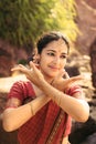 Beautiful indian woman dancer in traditional clothes at sunset Royalty Free Stock Photo