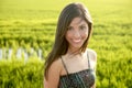 Beautiful indian woman in green rice fields Royalty Free Stock Photo