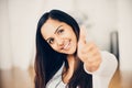 Beautiful Indian woman thumbs up happy smiling Royalty Free Stock Photo