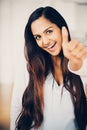 Beautiful Indian woman thumbs up happy smiling Royalty Free Stock Photo