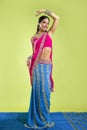 Beautiful indian young brunette woman dancing Royalty Free Stock Photo