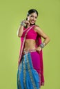 Beautiful indian young brunette woman dancing Royalty Free Stock Photo