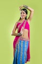 Beautiful indian young brunette woman dancing Royalty Free Stock Photo