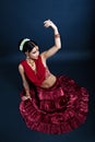 Beautiful indian young woman dancing in national clothes Royalty Free Stock Photo