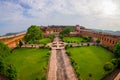 Beautiful indoor garden of the ancient indian palace in Amber fort in Rajasthan in Jaipur India, fish eye effect Royalty Free Stock Photo