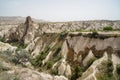 Beautiful inspiring scenic panoramic stone mountain landscape view of red valley with sky background, Cappadocia