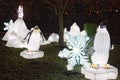 Beautiful installation group of penguins on ice. Figures illuminated by many lanterns during Festival of Chinese lanterns