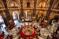 Beautiful interior of artistic cafe inside Kunsthistorisches Museum with big group of visitors