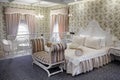 Beautiful interior of a bedroom in a luxurious room at the Old Town boutique hotel Royalty Free Stock Photo