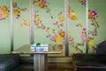 Beautiful interior of a chinese fine dining restaurant with chinoiserie wallpaper of flower pattern Royalty Free Stock Photo