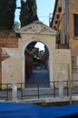 Beautiful Interior Courtyard Seen From Beautiful Small Canal Through An Archway In Venice. Travel, holidays, architecture. March