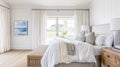 Beautiful interior of luxury bedroom with window sea view. Coastal cottage concept Royalty Free Stock Photo