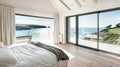 Beautiful interior of luxury bedroom with window sea view. Coastal cottage concept Royalty Free Stock Photo