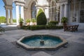 Beautiful interior patio with blue water fountain Royalty Free Stock Photo