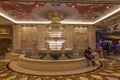 Beautiful interior view of Venetian hotel with people sitting near fountain. Strip, Las Vegas, Nevada,