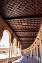 Beautiful intricate wooden ceiling on a majestic curved palacial walkway.