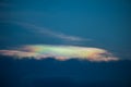 Beautiful iridescent cloud, Irisation or rainbow cloud on sky