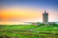 Beautiful irish castle near Atlantic ocean at sunset