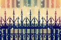 Beautiful iron fence on a blurred background with snow flakes Royalty Free Stock Photo