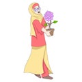 beautiful islamic girl is happy carrying a beautiful rose