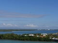 Beautiful island of Harvest Caye, Belize, surrounded by the blue waters of the Caribbean Sea Royalty Free Stock Photo