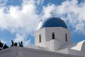 Beautiful island of Santorini, Greece. White Church with a blue dome in the village of Oia on the island of Santorini. Greek journ Royalty Free Stock Photo