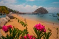 Beautiful island of Taboga, close to Panama city. View of the coastal town and a local landmark a statue of a fish. Looking