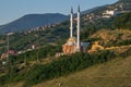 A beautiful isolated mosque with two tall minarets, built on a hill near the city of Prizren, Kosovo