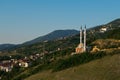 A beautiful isolated mosque with two tall minarets, built on a hill near the city of Prizren, Kosovo