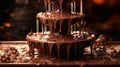 A beautiful Italian chocolate fountain flowing with cascades of glossy melted chocolate