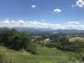 The beautiful Italian countryside with a distant view of the mountains of Northern Italy Royalty Free Stock Photo