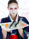 Beautiful japan geisha woman with sushi set