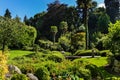 Japanese gardens in Powerscourt, with small bridge and variety of flowers and trees, Ireland Royalty Free Stock Photo