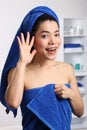 Beautiful japanese woman having fun in bathroom