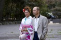 Beautiful Japanese woman kimono man suit